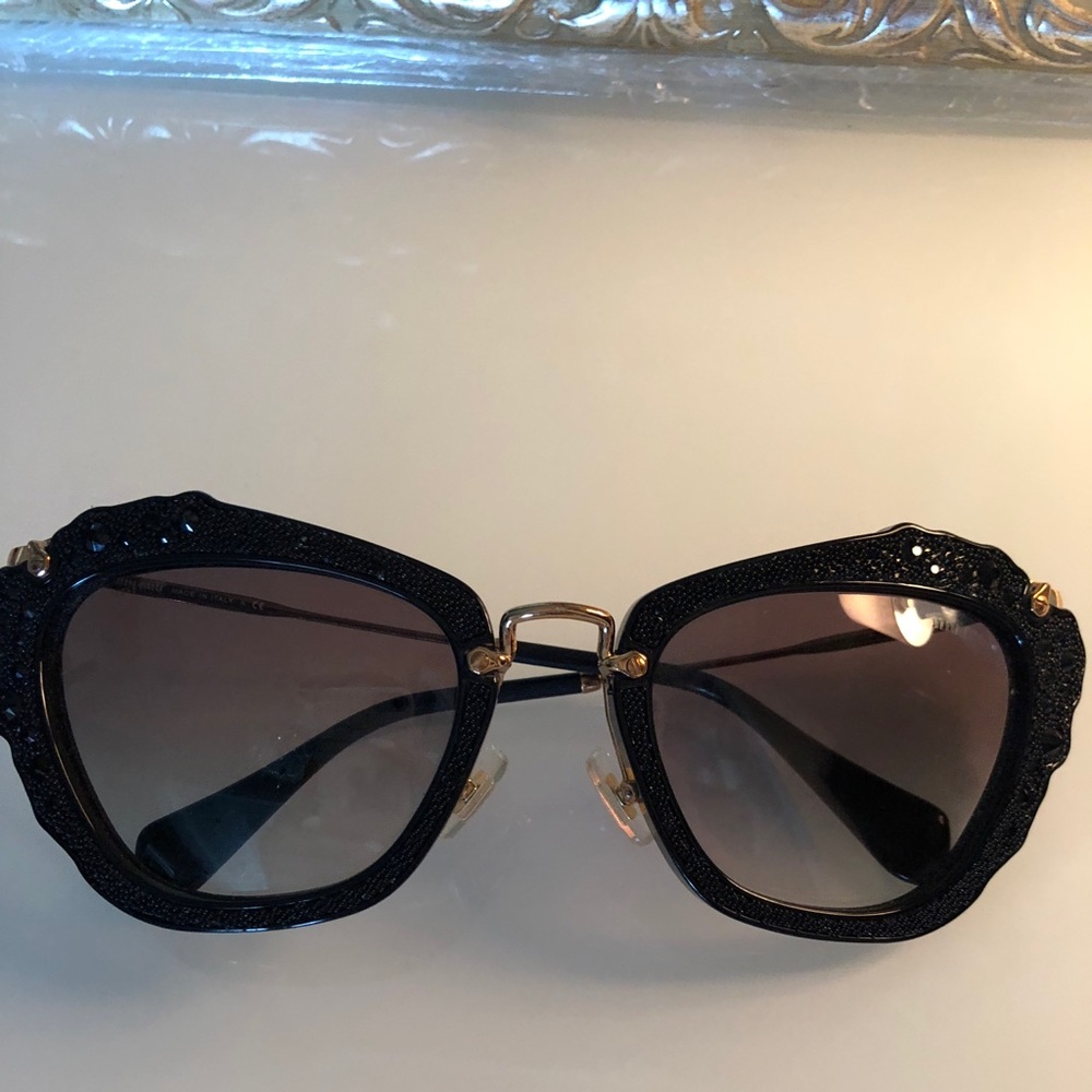 Miu Miu “Noir” sunglasses